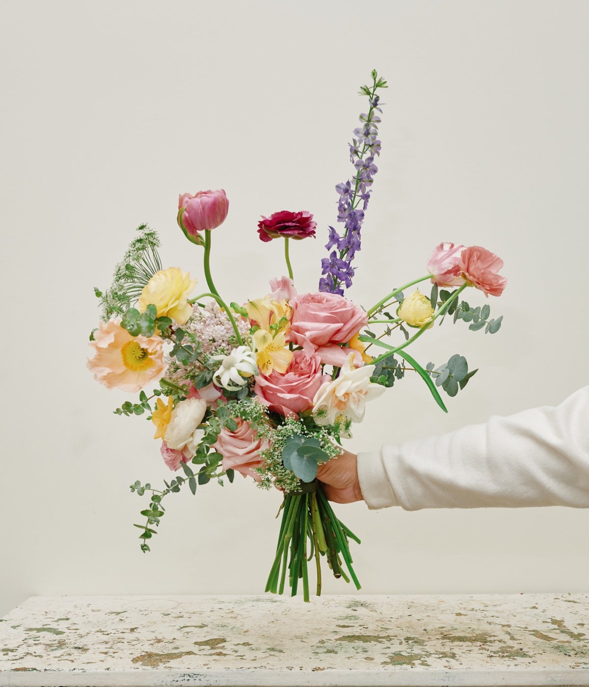 Fresh  flower bouquet with roses, tulips, peonies, and eucalyptus - Ora La Casa de Las Flores
